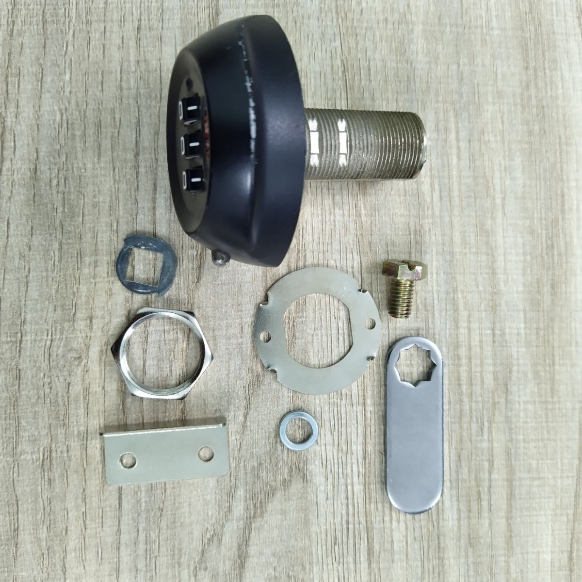 A picture containing metalware, wooden, lockDescription automatically generated
